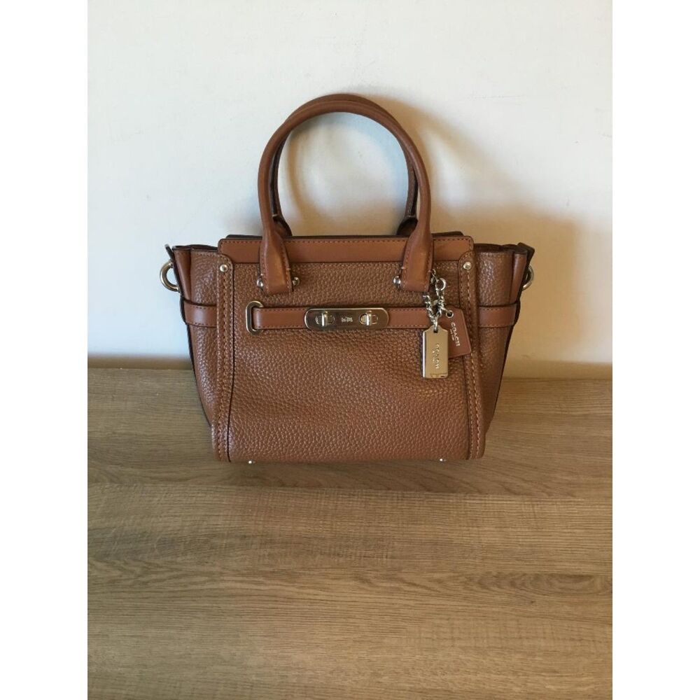 Coach Swagger 21 Pebble Leather in Saddle Brown w/Double Turnlock Metal Bar
